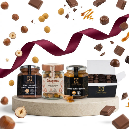 Pack Gourmand : pâte à tartiner noisette, dragées Dragatus, caramel beurre salé et ballotin de chocolats, avec ruban bordeaux